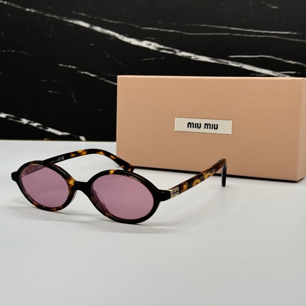 Miu Miu Tortoise Shell Sunglasses with Pink Lenses